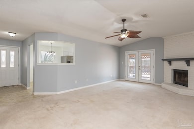 Spacious living room with vaulted ceiling