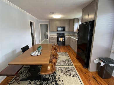 Another view of kitchen/dining