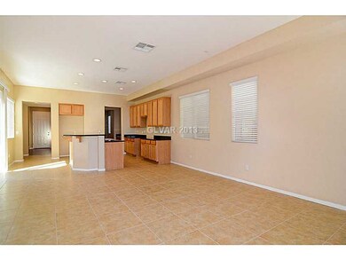 Property Photo. Family Room looking into Kitchen