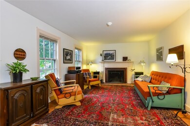 Living Room with Brick Fireplace