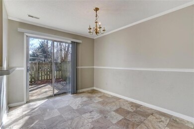 Dining Room area and glass doors to fenced patio area