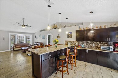 Kitchen towards lmain living area.