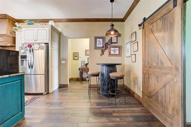 Kitchen featuring dark hardwood / wood-style floor