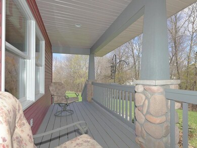 Enjoy Relaxing on this Covered Porch.