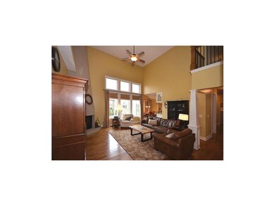 Gathering room with vaulted 2 story ceiling, one o