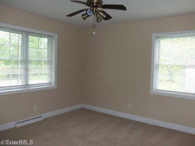 Master Bedroom. The front bedroom has a ceiling fan and a private 1/2 bath.....