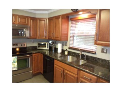 Kitchen. See the range and microwave, dishwasher a