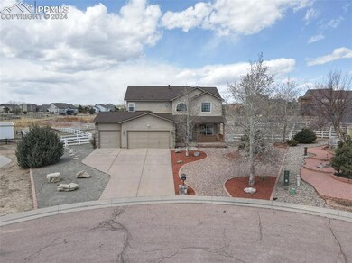 Front of property featuring a garage