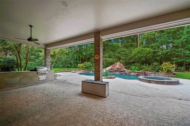 Oversized back porch with grill and wash station. Wired for surround sound!