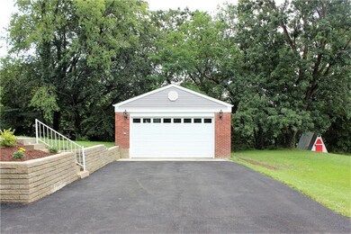 Detached 2 car garage with driveway parking for 12