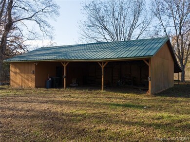 View of shed / structure with a yard