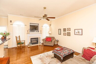 A huge Great Room features gorgeous hardwood floor