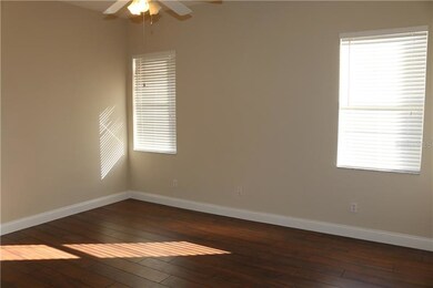 Master measures 16 x 14, with wood flooring, and p