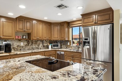Kitchen Island and Granite throughout