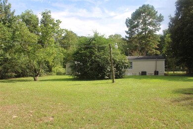 571 County Road 3796, Cleveland, TX 77328 - photo 3