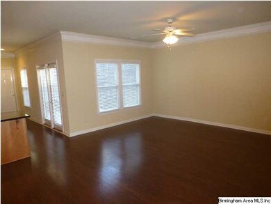 Large Den with great day light. Wood floors on the
