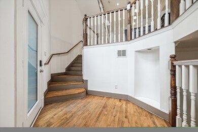 Impressive formal entry with soaring 17-foot ceili