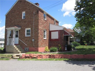 Side of home showing side porch, updated elec, win