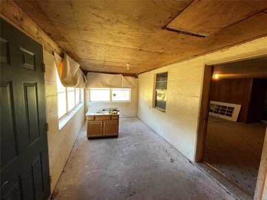 enclosed porch. Extra Vanity comes with the house.