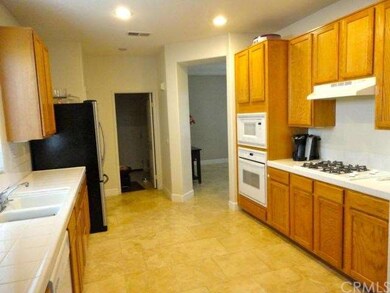 Spacious Kitchen, Travertine Floors, Pantry & Laun