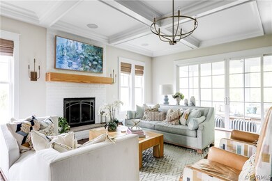 A graceful family room features a brick gas firepl