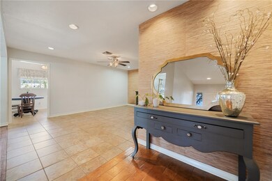 ENTRY WITH A VIEW OF LIVING ROOM