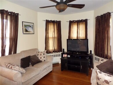 2nd floor living room- hardwoods, replacement wind