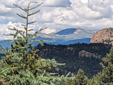 Property has snow-capped views in colder months.  This photo depicts shadows of the clouds.