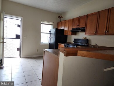 1621 N Gilmor St, Baltimore, MD 21217 - photo 4
