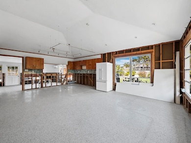 Current condition - The high ceilings and open plan living room and kitchen maximize the convenient floor plan