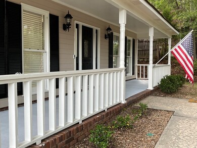 FRONT PORCH IS 50' WIDE & 6' DEEP