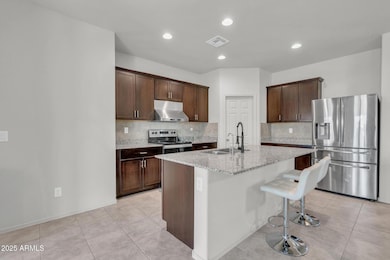 Kitchen with Granite and Stainless Ste