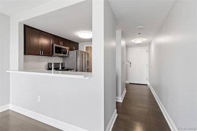 Dining Room looking into the Kitchen and the Entrance Hallway