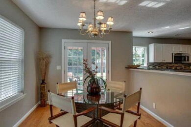 Dining Room connects to kitchen, family room and view of patio