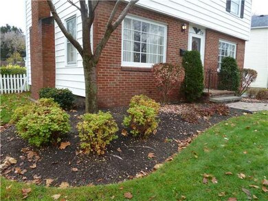 Exterior Front. Well landscaped yard .....