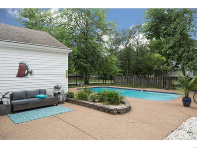 This home sits on a corner lot with an inviting in