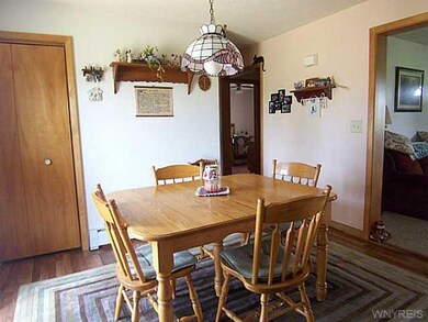 Dining Room. DINING AREA HAS PANTRY FOR STORAGE.