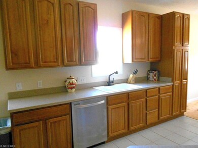 Great counter space, tall wall cabinets and a pant