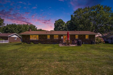 Twilight view of the back of the house