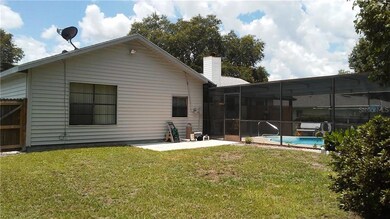 HOME AS SEEN FROM RIGHT REAR OF PROPERTY