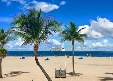 Lounge chairs and umbrellas provided by beach atte
