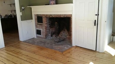 Formal dining room fireplace.