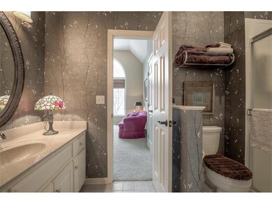 Main floor bath with hall access and access to 2nd