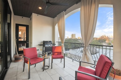The balcony overlooks downtown and the Texas Medic