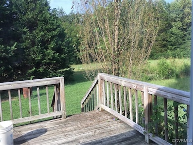 Deck featuring a yard
