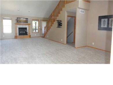 Gas fireplace at end of living room