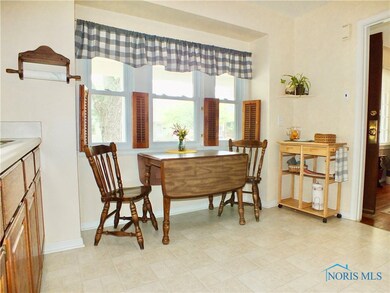 Kitchen with windows that let in lots of natural l