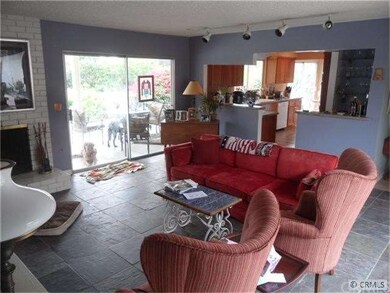 Family Room and Kitchen with views of pool and yar