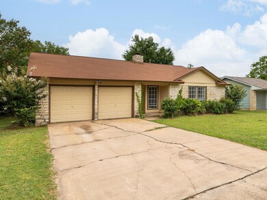 View of front of home with an attached garage, dr