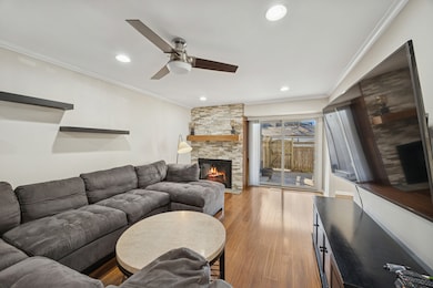 Stone front gas start wood burning fireplace